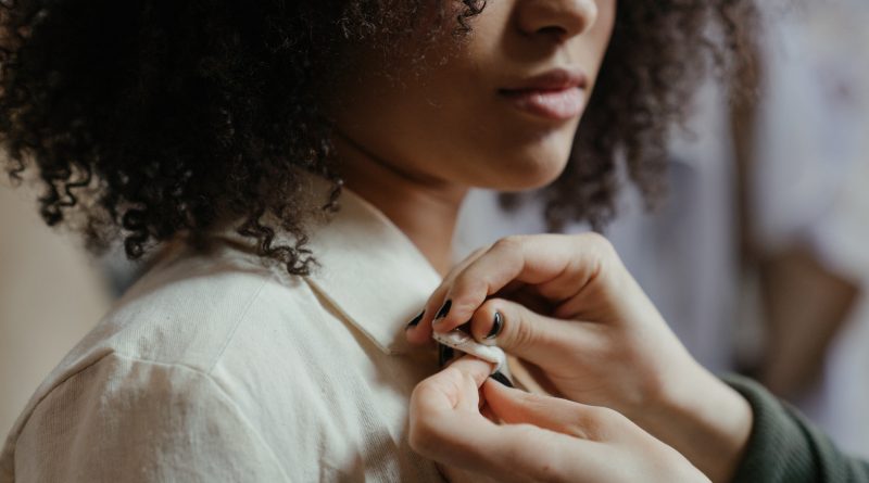 Lady getting shirt tailored