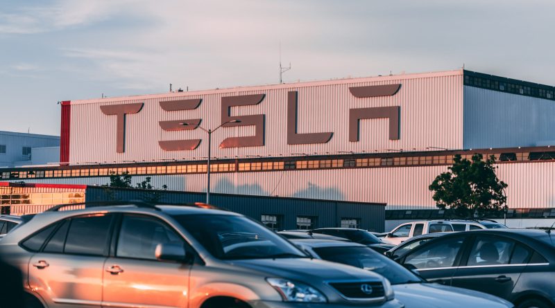 Photo of Tesla written on a building
