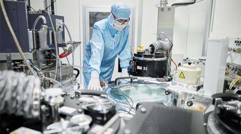 Worker in lab dress for Apple