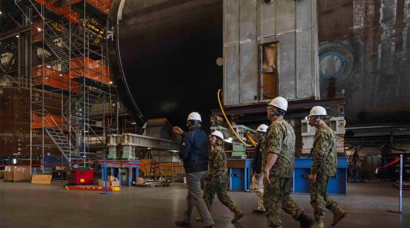 A modern 3D printing facility specializing in submarine manufacturing, with state-of-the-art equipment, diverse engineers, and various submarine components.