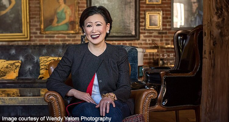 Portrait image of Sonita Lontoh sat in a leather seat in a professional setting to support women in manufacturing article