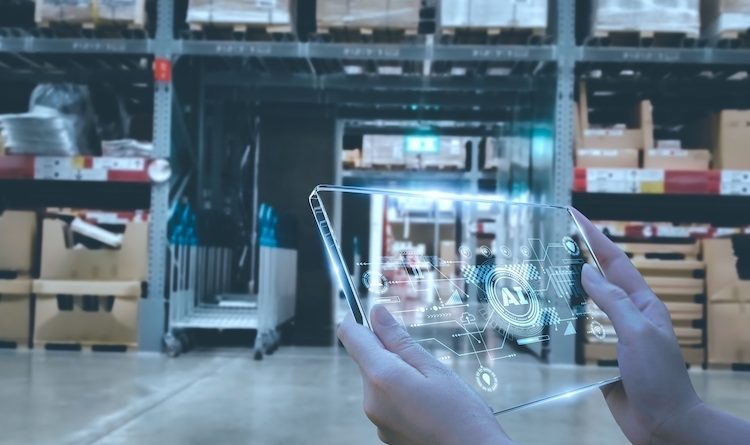 Manager using smart tablet monitor process Analyzes, check and control product in stock warehouse, modern software, futuristic concept smart warehouse management system in Factory industry in