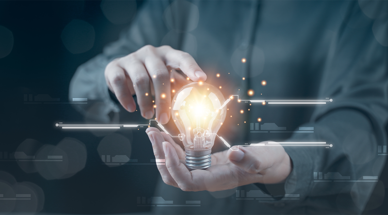 Man holding a lightbulb in his hand to support PolyMorphic Moulding manufacturing innovation article