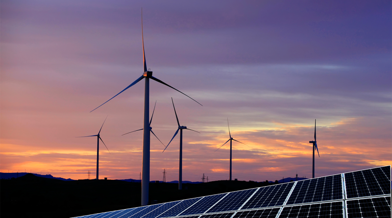Windfarms and solar panels in field to support Chinese clean energy article