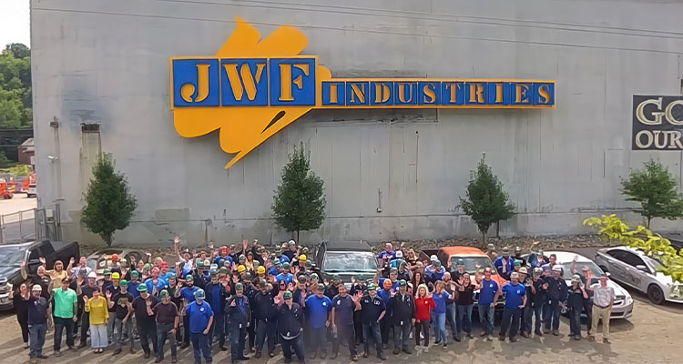 Staff outside JWF facilities