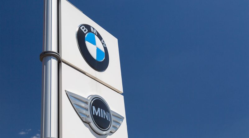 BMW and Mini logos on sign to support Mini EV article