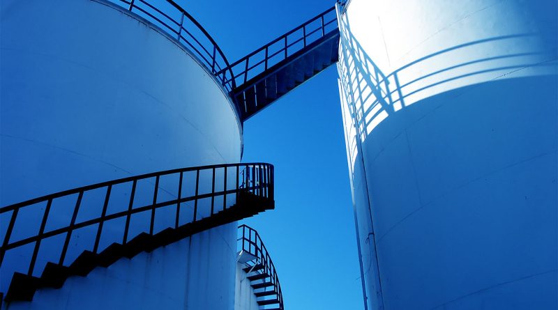 Large water storage tanks joined together by stairs to support Balmoral Tanks article