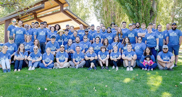 Fishbowl's US team at the Day of Service, an annual company-sponsored volunteer opportunity near their corporate headquarters in Utah, where employys are able to give back to the community