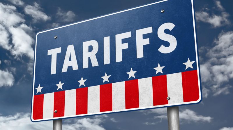 Tariffs sign with US flag stars and colours to support Mary Barra article