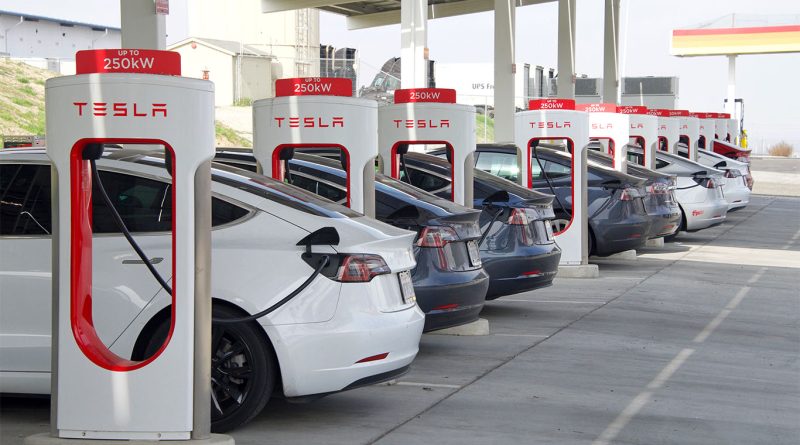 Tesla car factory with EV competitors and Elon Musk’s political shadow