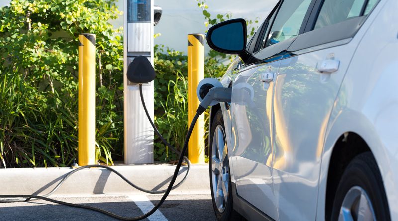 EV assembly line inside a U.S. automotive factory facing policy uncertainty