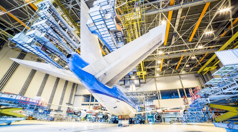 Refurbishment of an airplane in a hangar.