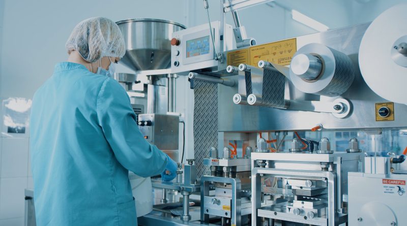 Tablet pharmaceutical blister packaging machine in supplement drug manufacture.