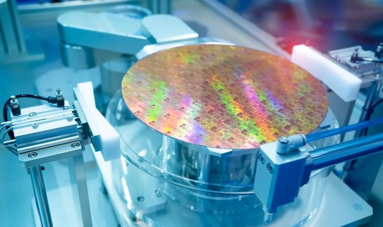 a semiconductor wafer undergoing processing in a manufacturing facility.
