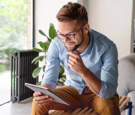 Man reading on device