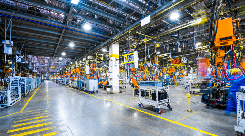 American factory floor with machinery and workers