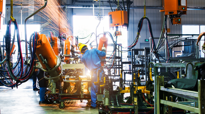 Welding robots movement in a car factory