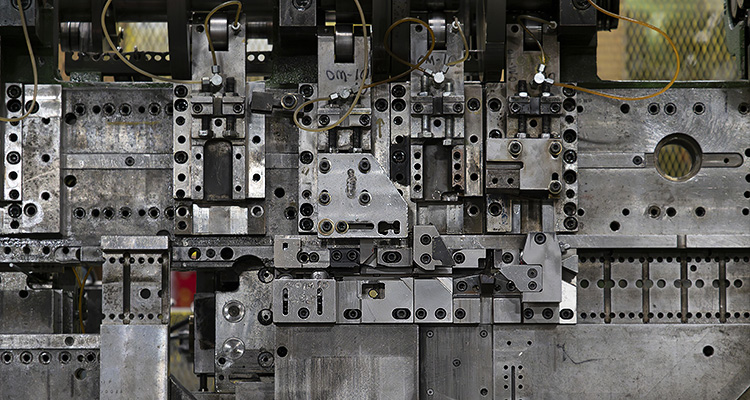 the intricate tooling of an injection molding machine