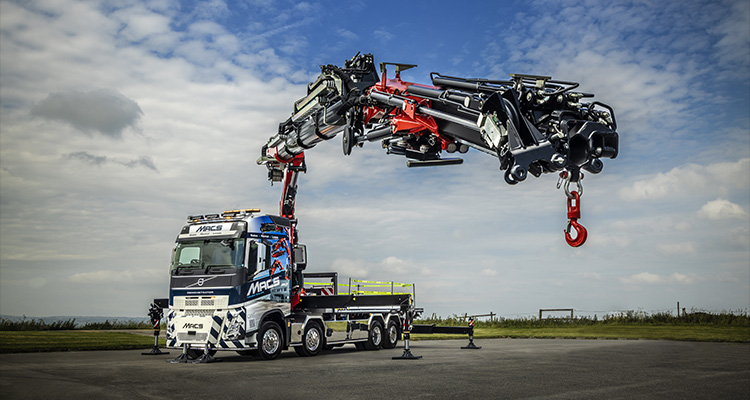 a FASSI F905/F1050 Techno range crane mounted on a Volvo truck chassis