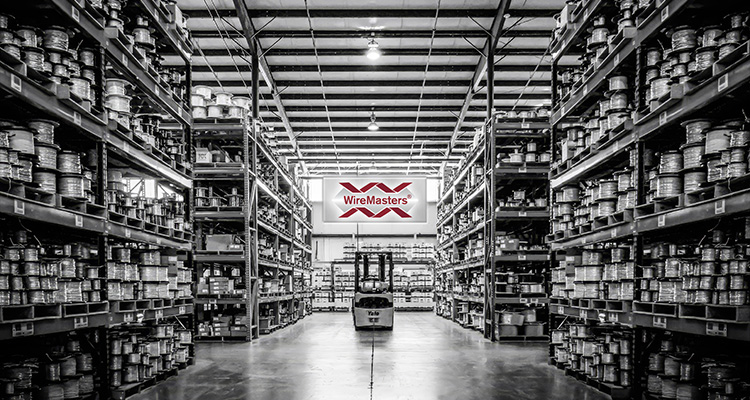 a warehouse aisle for WireMasters, a global supplier of wire, cable, and related products.