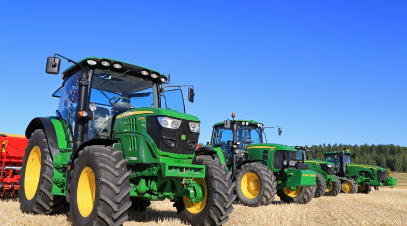 Line up of John Deere Agricultural Tractors