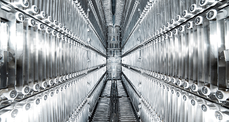 the highly reflective, metallic interior of an industrial system