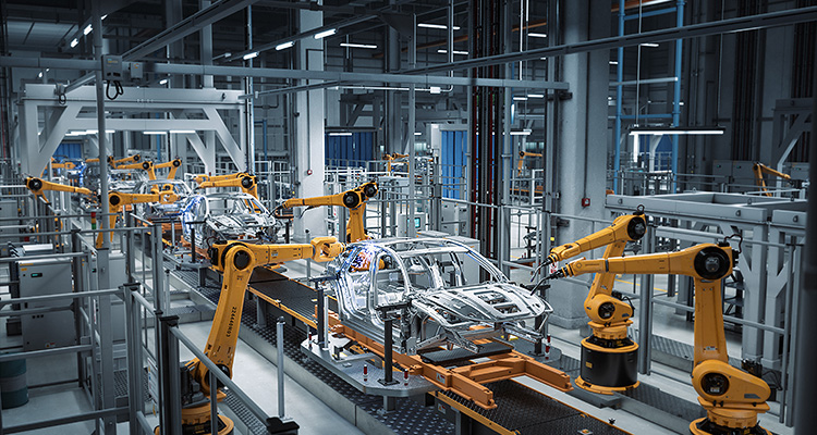 Automotive industry adaptation in the age of EVs. By Rohit Auluck a modern, automated automotive assembly line featuring robotic arms assembling car chassis.